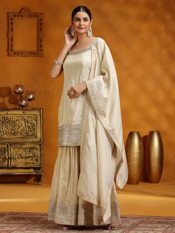 Cream silk wedding wear sharara suit with dupatta