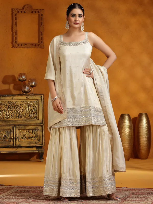 Cream silk wedding wear sharara suit with dupatta