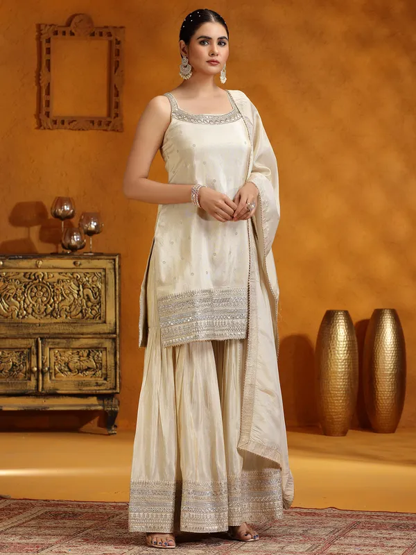 Cream silk wedding wear sharara suit with dupatta