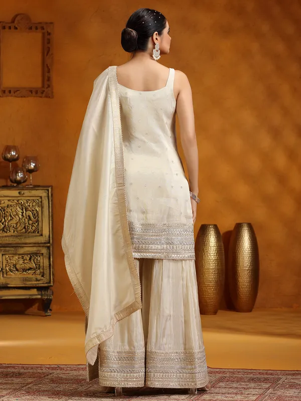 Cream silk wedding wear sharara suit with dupatta