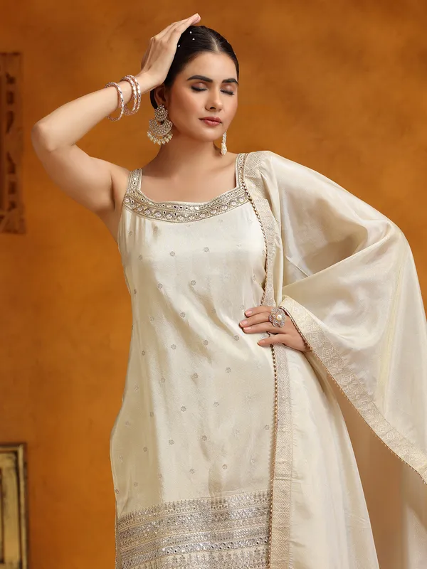 Cream silk wedding wear sharara suit with dupatta