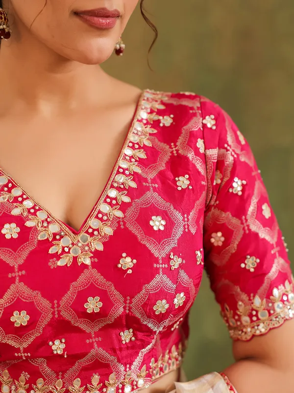 Cream silk zari worked saree with red blouse wedding look