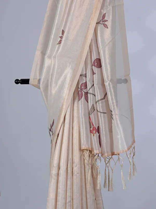 Cream tissue cotton silk saree with sequins and embroidery detailing