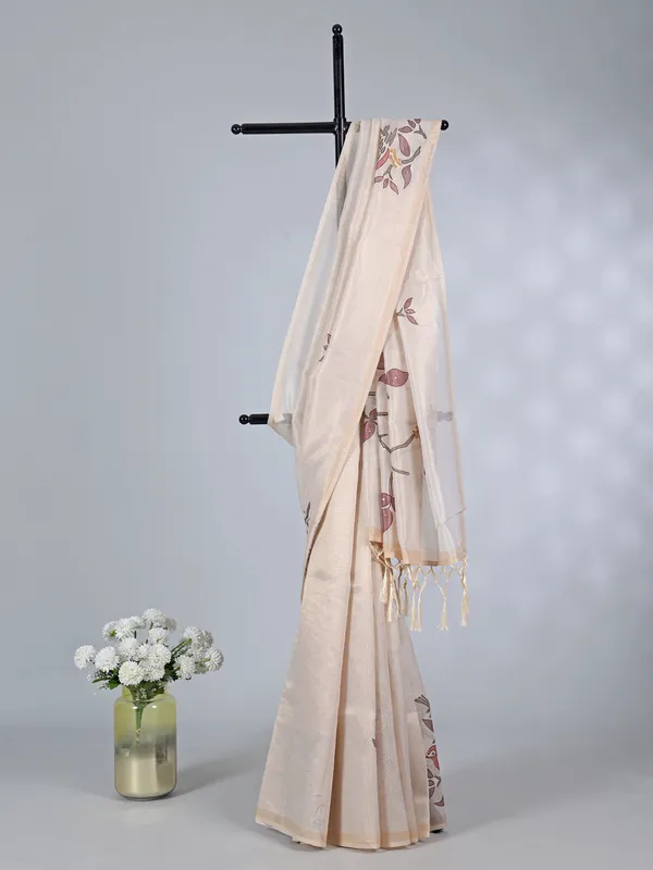 Cream tissue saree with threaded elegance