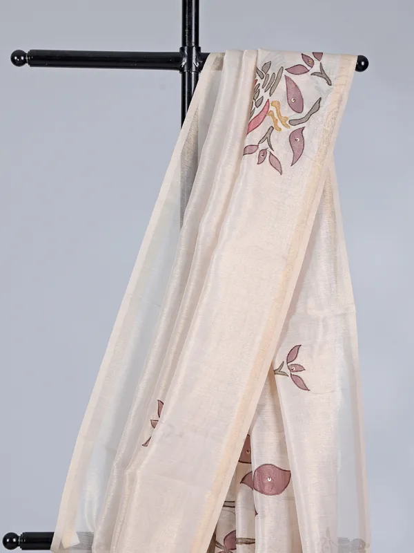 Cream tissue saree with threaded elegance