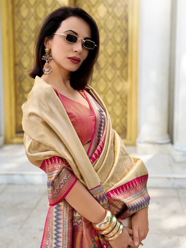 Cream tissue silk saree in zari weaving