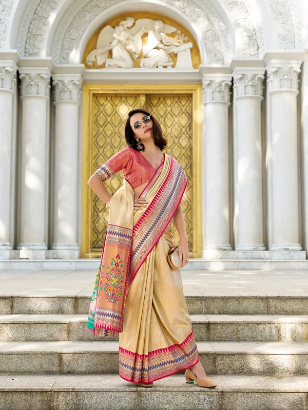 Cream tissue silk saree in zari weaving