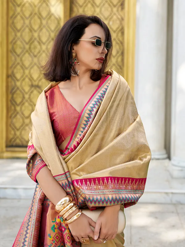 Cream tissue silk saree in zari weaving