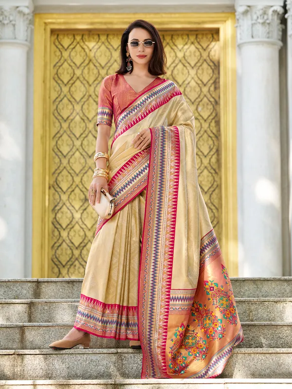 Cream tissue silk saree in zari weaving