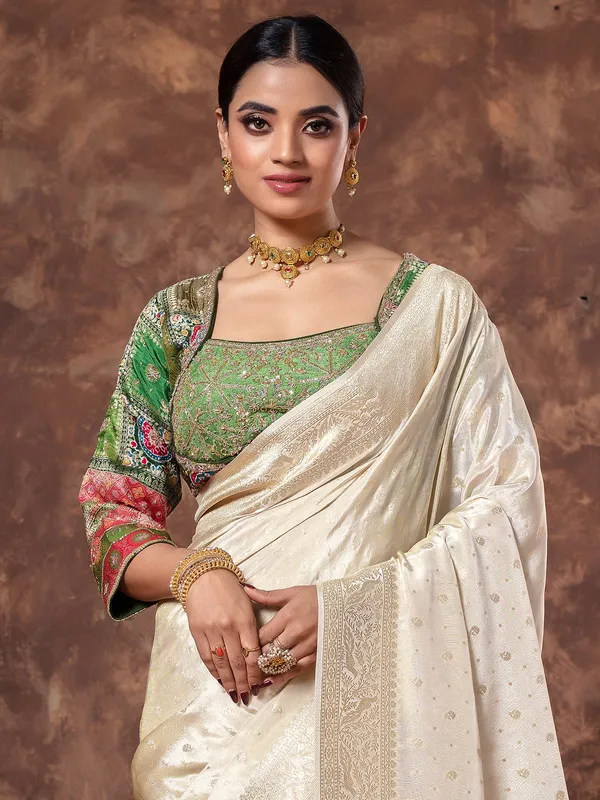 Cream tissue silk zari weaving saree