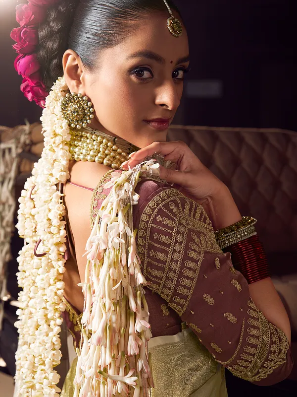 Cream viscose tissue silk saree for elegant wedding ensemble