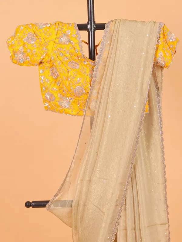 Cream wedding wear saree in organza
