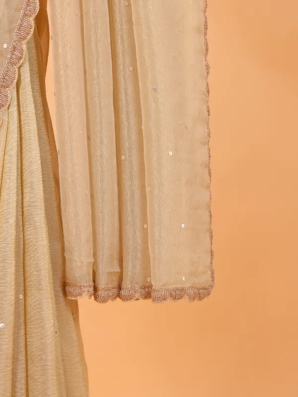 Cream wedding wear saree in organza
