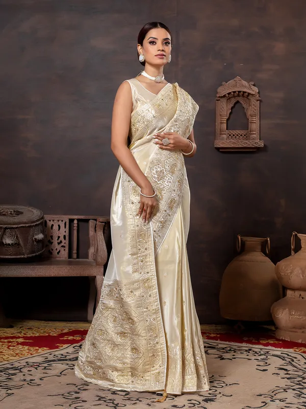 Cream wedding wear saree in rich dola silk