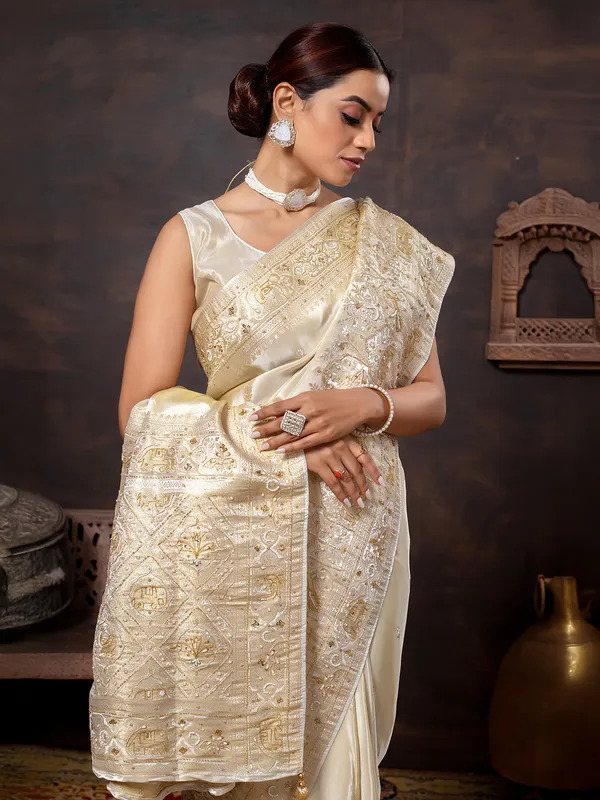 Cream wedding wear saree in rich dola silk