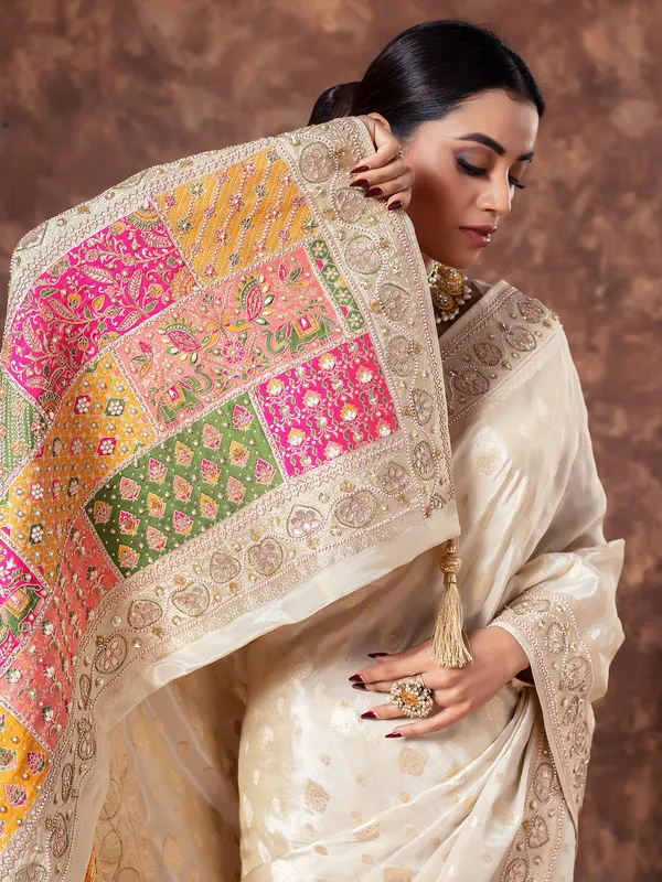 Cream wedding wear saree in tissue silk