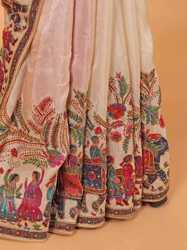 Cream wedding wear saree in zari weaving