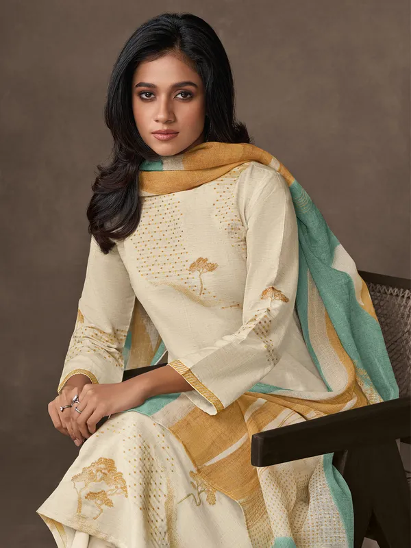 Cream zari worked salwar suit in cotton silk