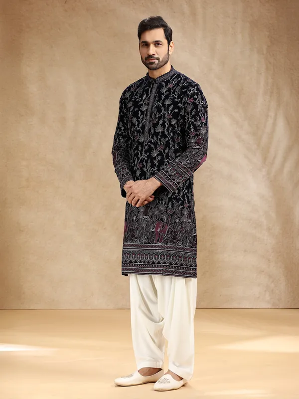 Dark blue velvet kurta pajama with shimmering resham work