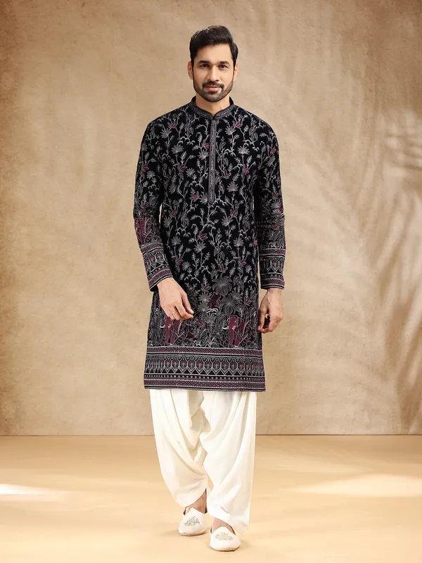 Dark blue velvet kurta pajama with shimmering resham work
