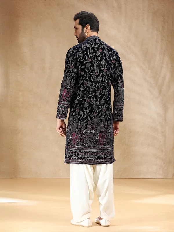 Dark blue velvet kurta pajama with shimmering resham work