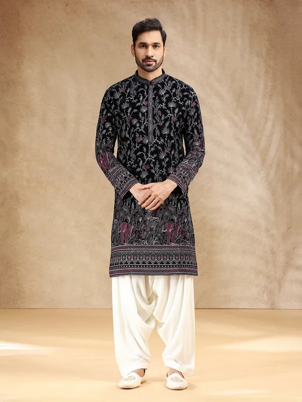 Dark blue velvet kurta pajama with shimmering resham work