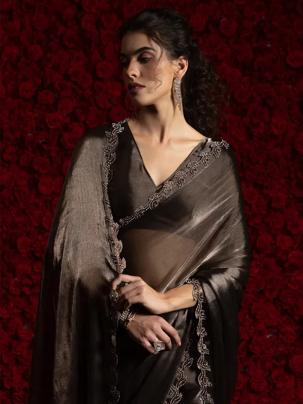 Dark brown chiffon saree with stone embellishment