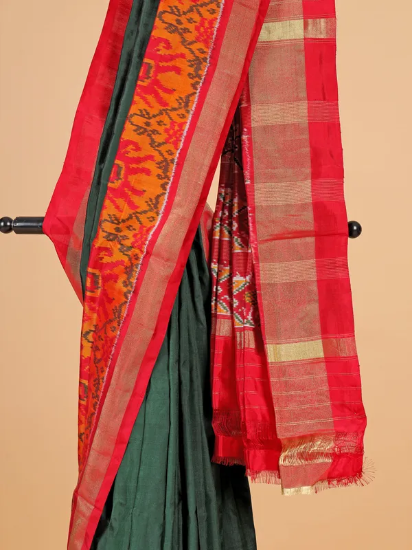 Dark green bandhej printed silk saree