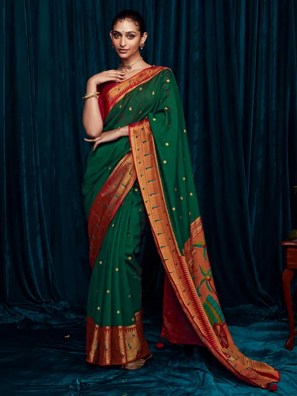 Dark green brasso silk minakari saree