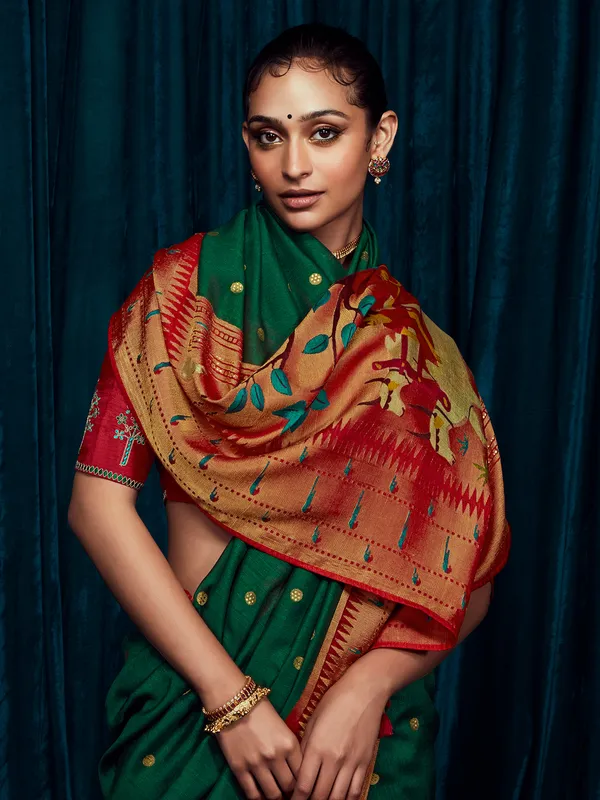 Dark green brasso silk minakari saree