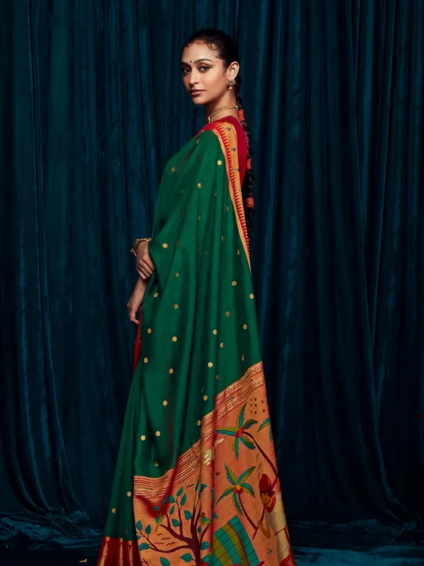Dark green brasso silk minakari saree