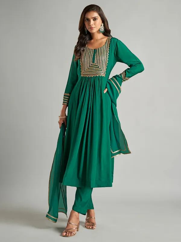 Dark green chiffon salwar suit for festive