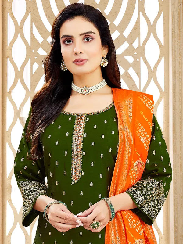 Dark green cotton silk salwar suit for celebrations