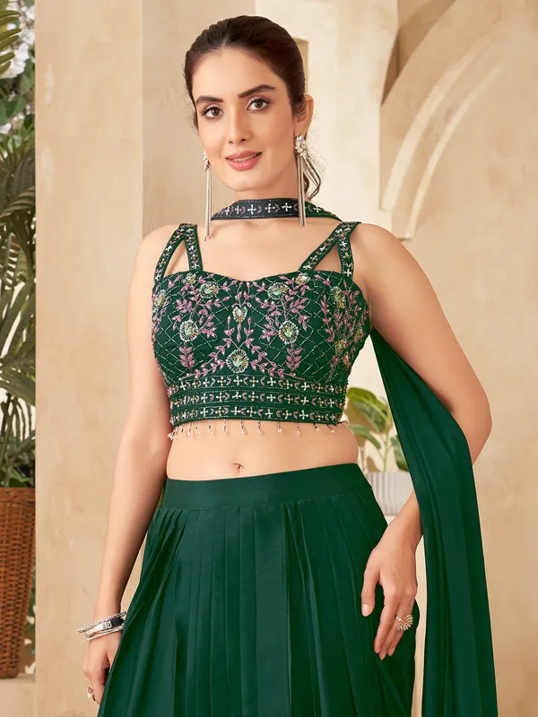 Dark green designer suit for women
