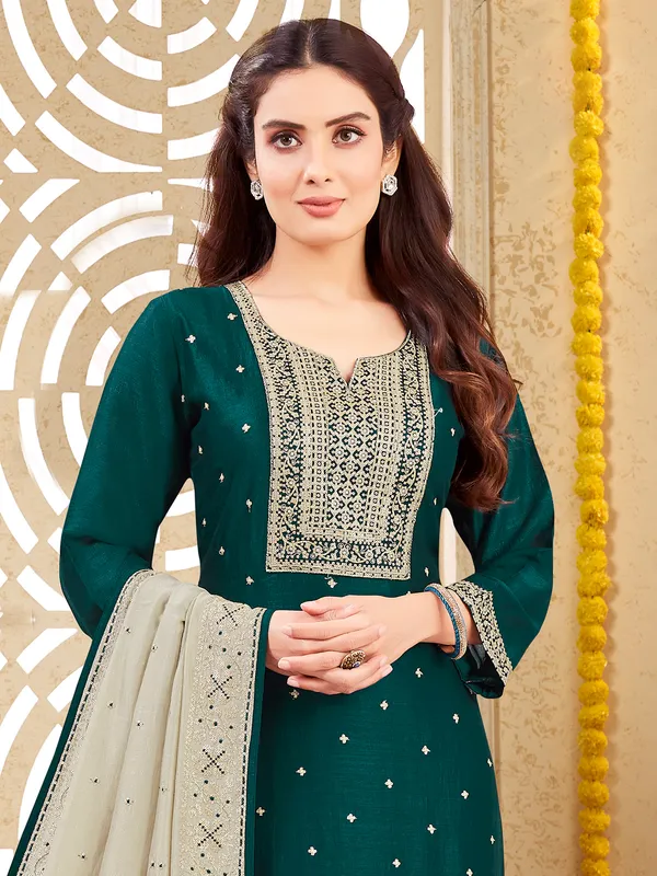 Dark green festive wear silk salwar suit