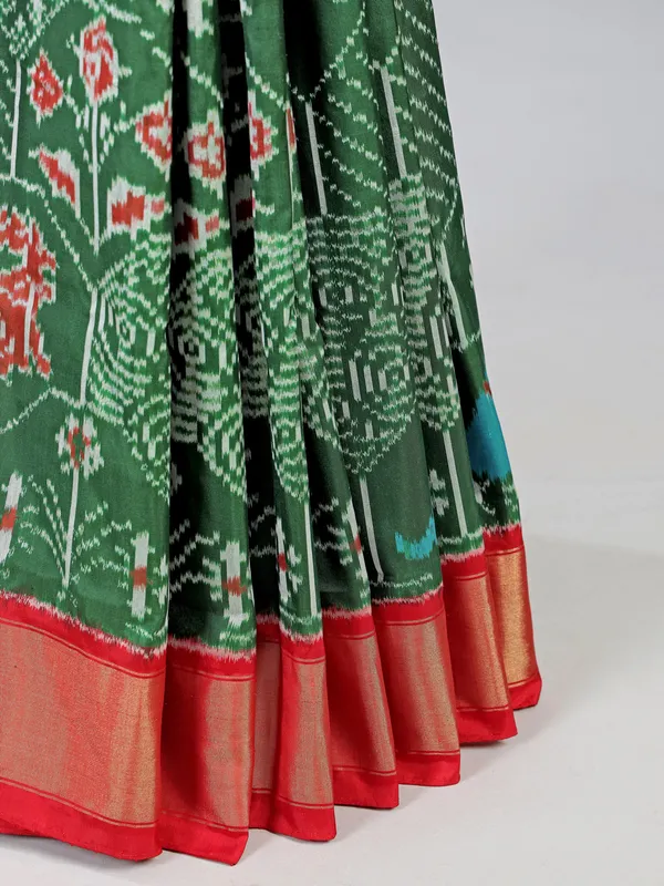 Dark green patola silk saree for mehendi ready