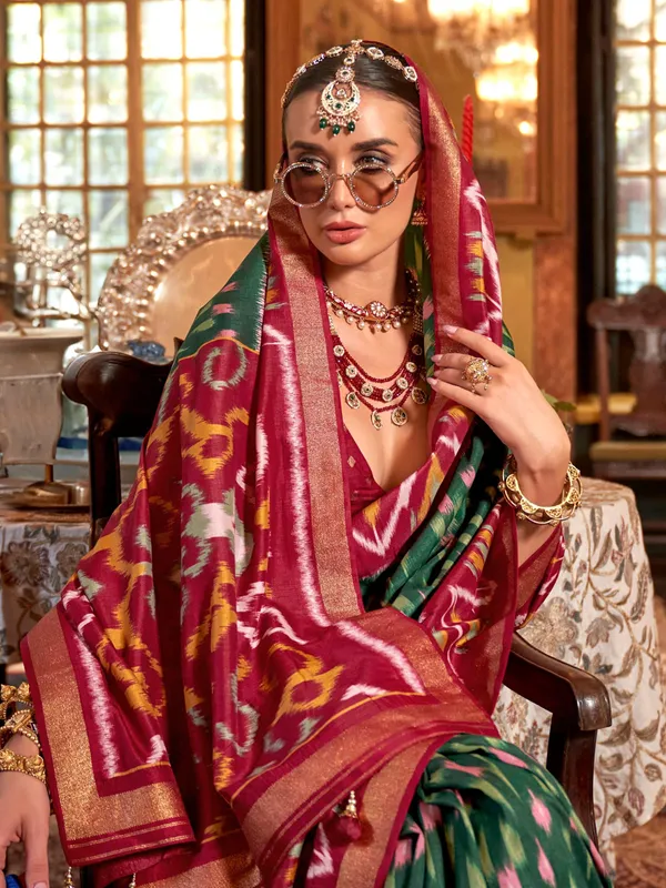 Dark green printed silk saree with maroon border