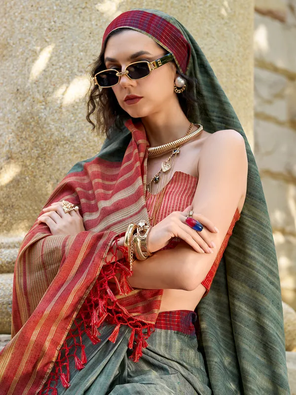 Dark green red silk saree with zari weaving
