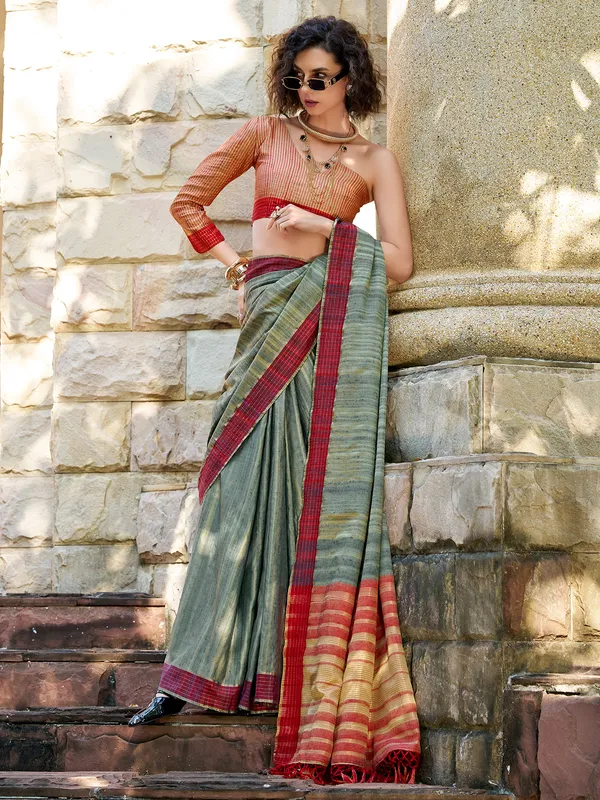 Dark green red silk saree with zari weaving
