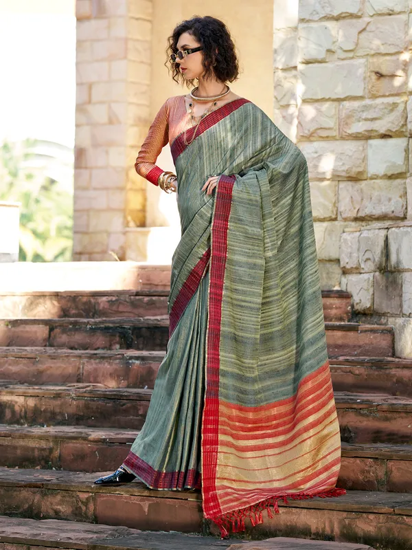 Dark green red silk saree with zari weaving