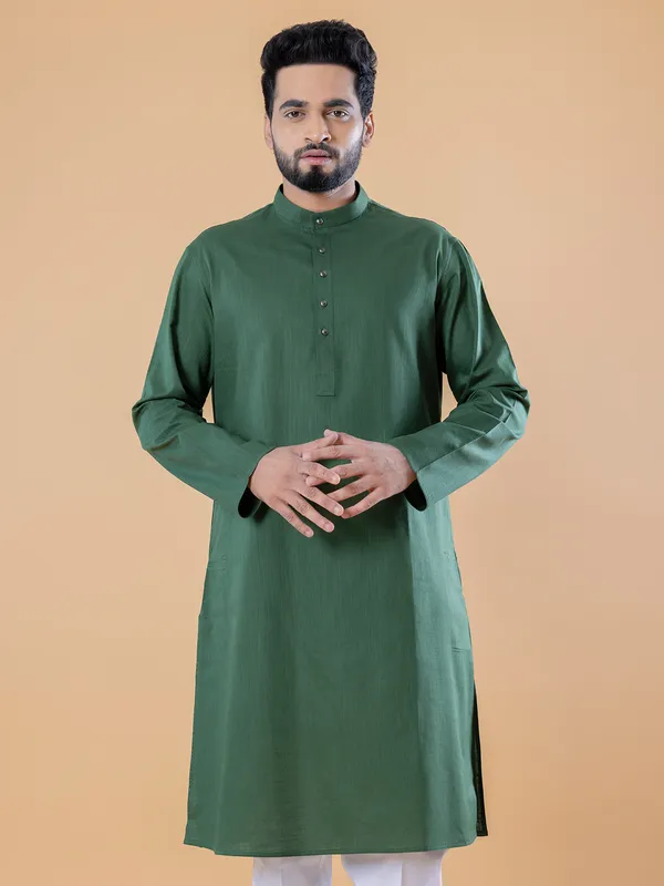 Dark green rich plain cotton kurta suit