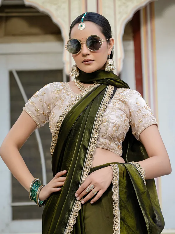Dark green satin silk saree with embellished elegance