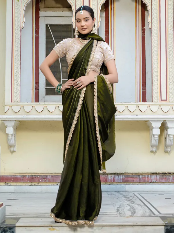 Dark green satin silk saree with embellished elegance