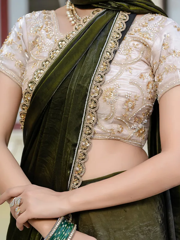 Dark green satin silk saree with embellished elegance