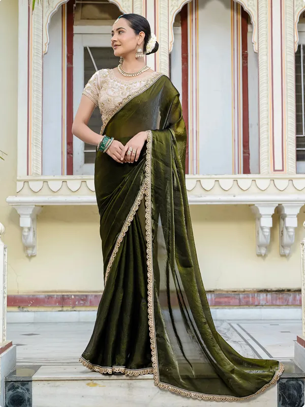 Dark green satin silk saree with embellished elegance