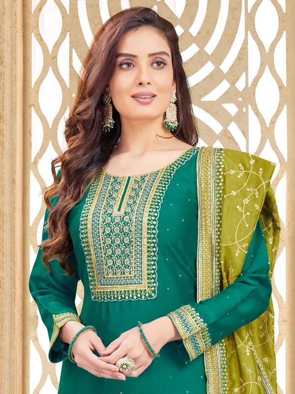 Dark green silk salwar suit with olive dupatta