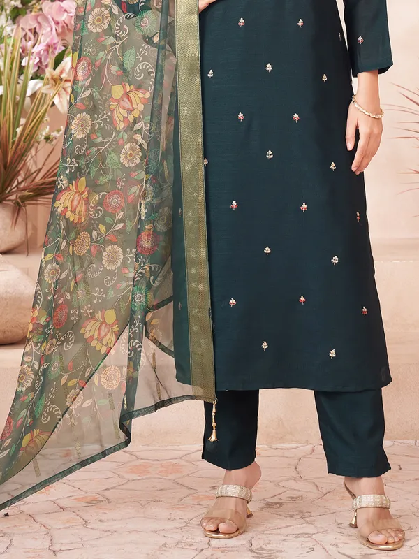 Dark green silk salwar suti with printed dupatta