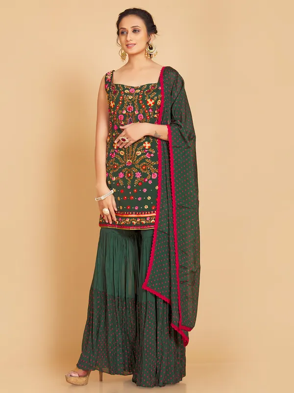 Dark green silk sharara suit for festive