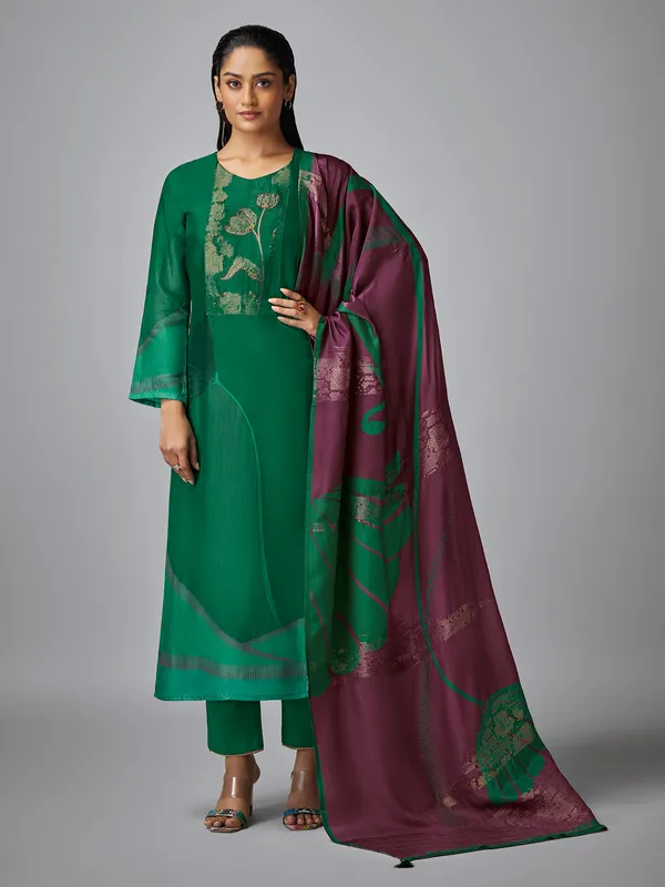 Dark green silk thread worked salwar suit