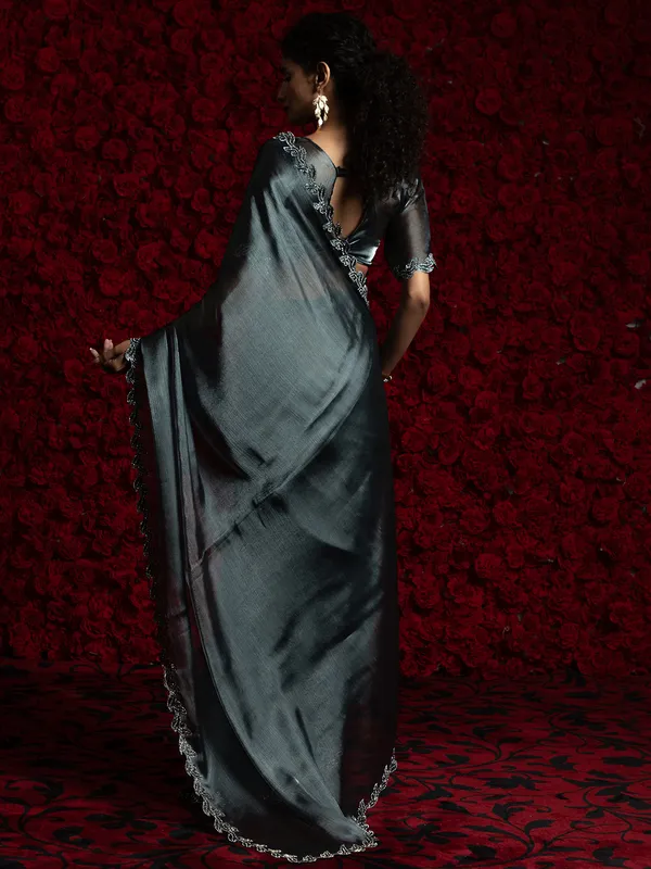 Dark grey chiffon saree with cutdana work